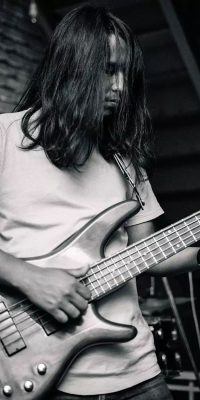 Vicky- Base guitarist